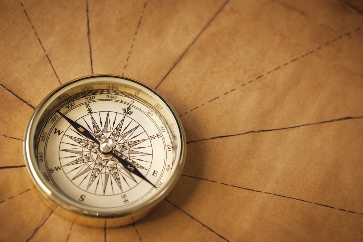 woman holding adventure begins coffee cup